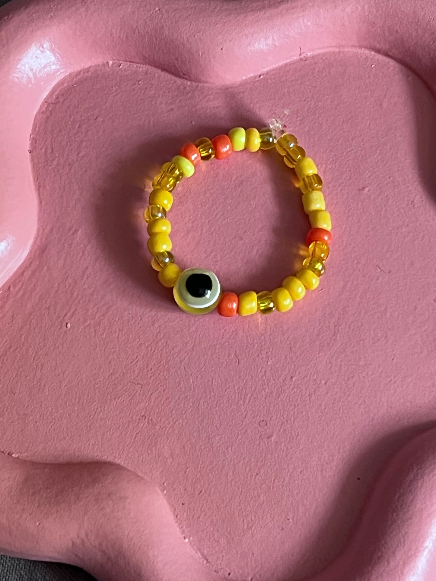 Orange evil eye bracelet and ring set