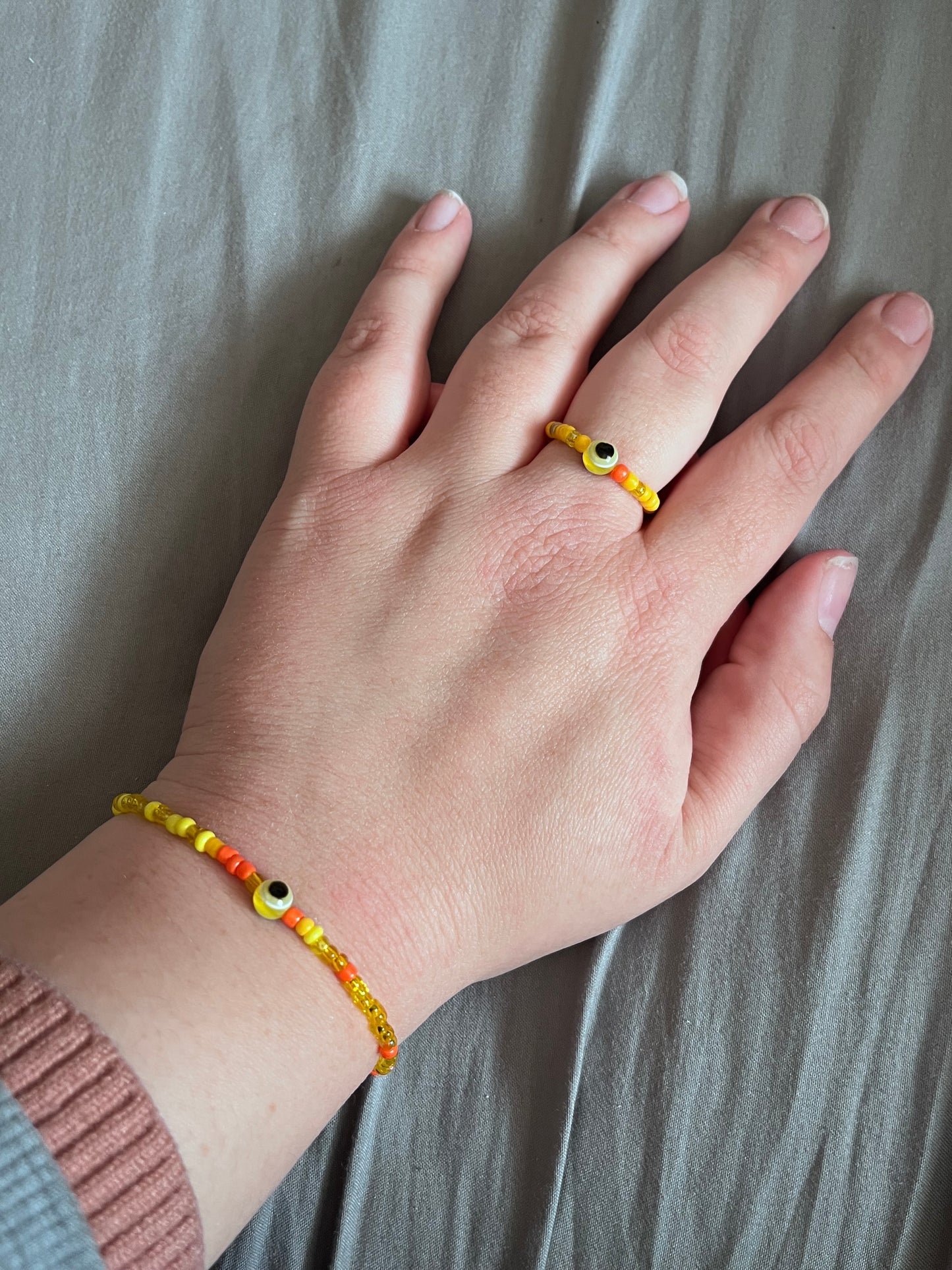 Orange evil eye bracelet and ring set