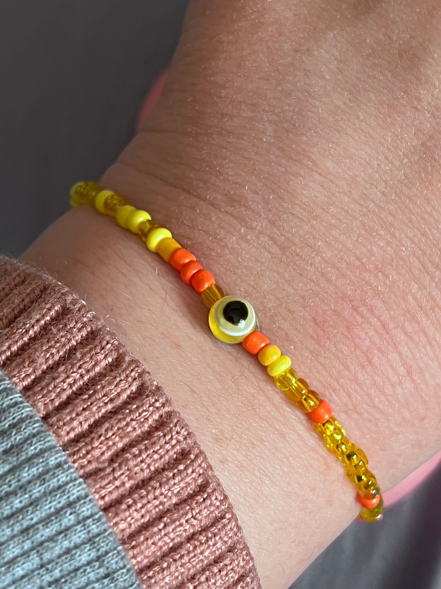 Orange evil eye bracelet and ring set